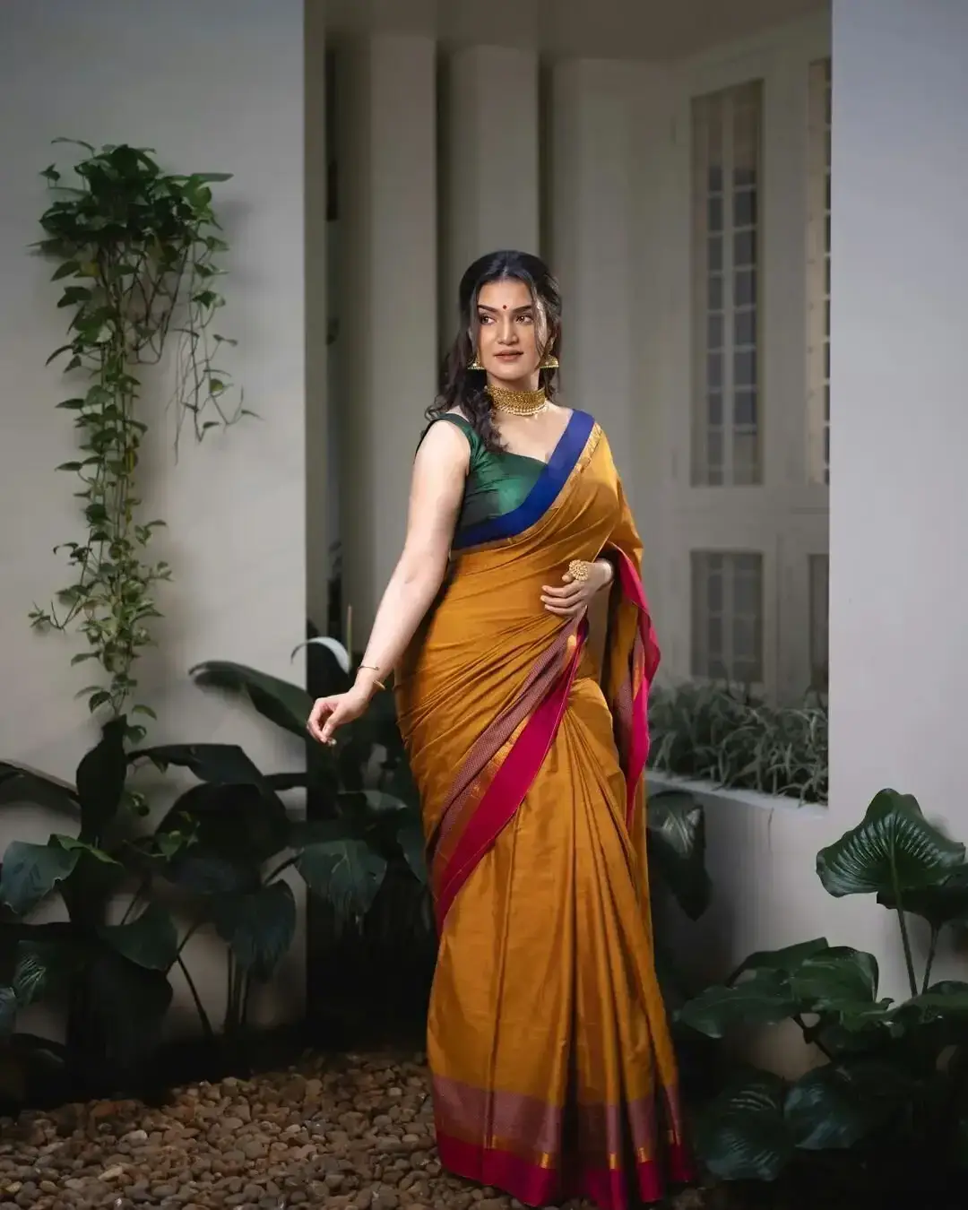 Beautiful Indian Model Honey Rose in Sleeveless Yellow Saree